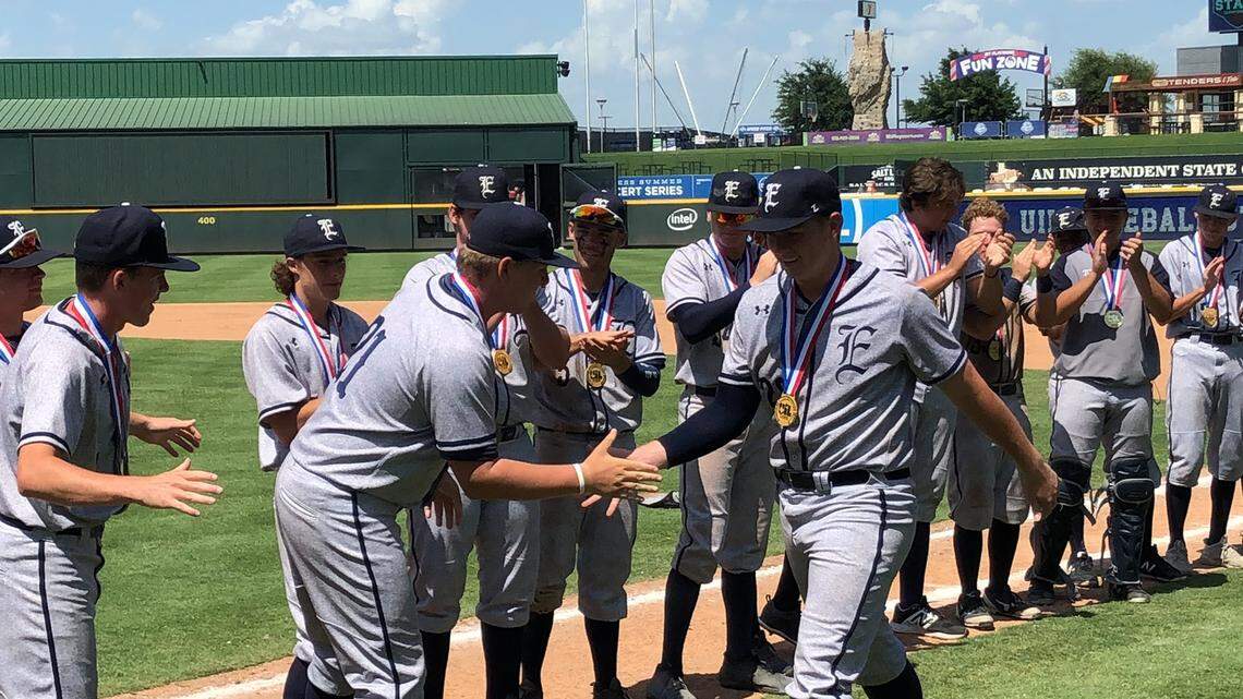 Haslet Eaton senior RHP Riley Taylor is congratulated after winning the 5A state MVP award at Dell Diamond, Saturday, June 9, 2018.