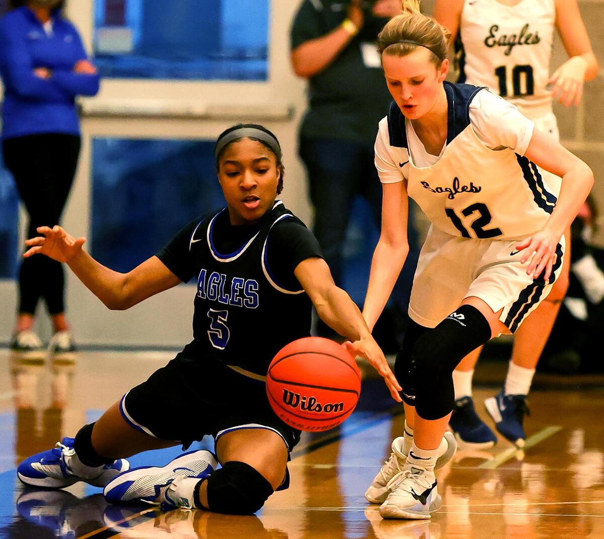 Fort Worth Southwest Christian guard Arieona Rosborough (5) tries to get a loose ball against Houston Second Baptist guard Olivia Sauvageau (12) during the second half of the 5A TAPPS Girls Basketball State Championship game played on March 12, 2021 at College Station High School in College Station, TX. (Steve Nurenberg Special to the Star-Telegram)