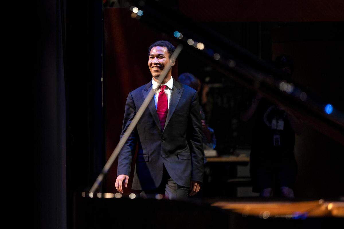 Clayton Stephenson exits the stage after finishing his recital during the semifinals of the 16th Cliburn International Piano Competition at Bass Performance Hall in Fort Worth, Texas, on Thursday, June 10, 2022.
