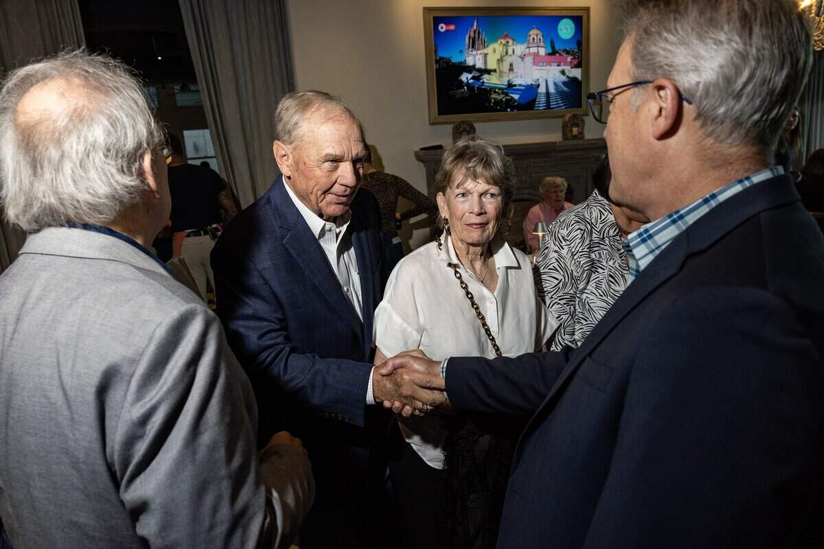 Steve Coffman and Bud Kennedy speak with event attendees at the Eats Beat Dinner with Bud at Quince in Fort Worth on Tuesday, Oct. 28, 2025.