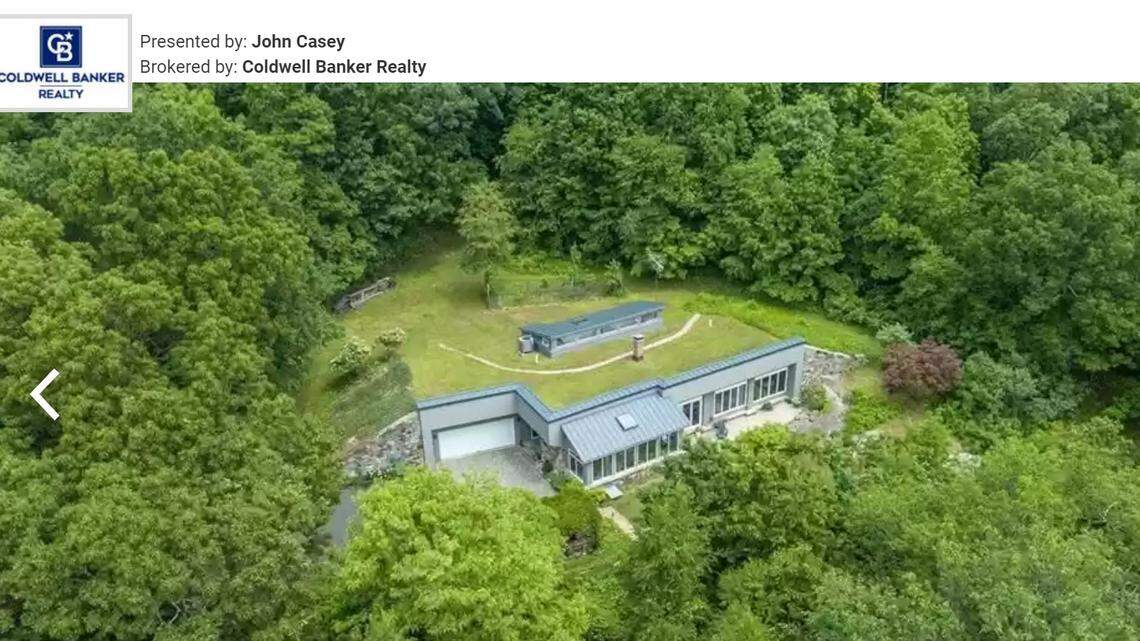 A solar earth sheltered contemporary ranch home that sits on 11-plus private wooded acres has listed for $695,000 in New Fairfield, Connecticut.