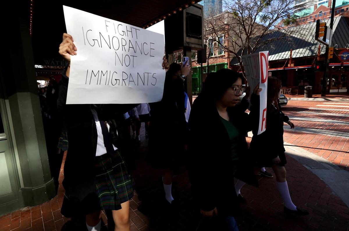 Students at Young Women’s Leadership Academy in downtown Fort Worth walk out of school on Monday, Feb. 3, to protest federal immigration policies they say are harming their families.