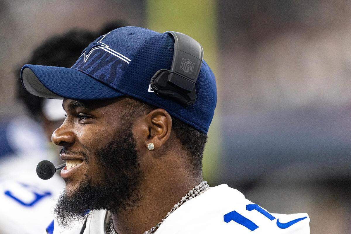 Dallas Cowboys defensive lineman Micah Parsons (11) sits out and has the head set on during the first preseason game between the Dallas Cowboys and Jacksonville Jaguars at AT&T Stadium in Arlington, Texas on Saturday, Aug. 12, 2023.