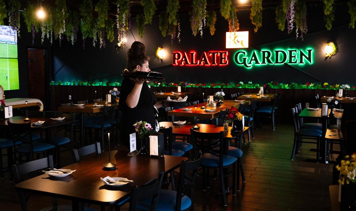 Bartender Delilah Bunata serves a table at Palate Garden on Thursday, April 3, 2025, in Saginaw.