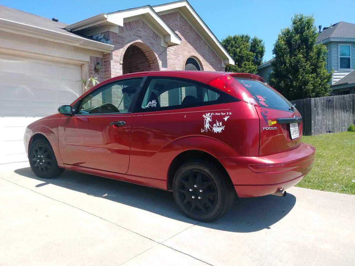 Amanda Simpson's car, according to a neighbor, parked in front of the Ponder house where a murder-suicide happened Wednesday morning.