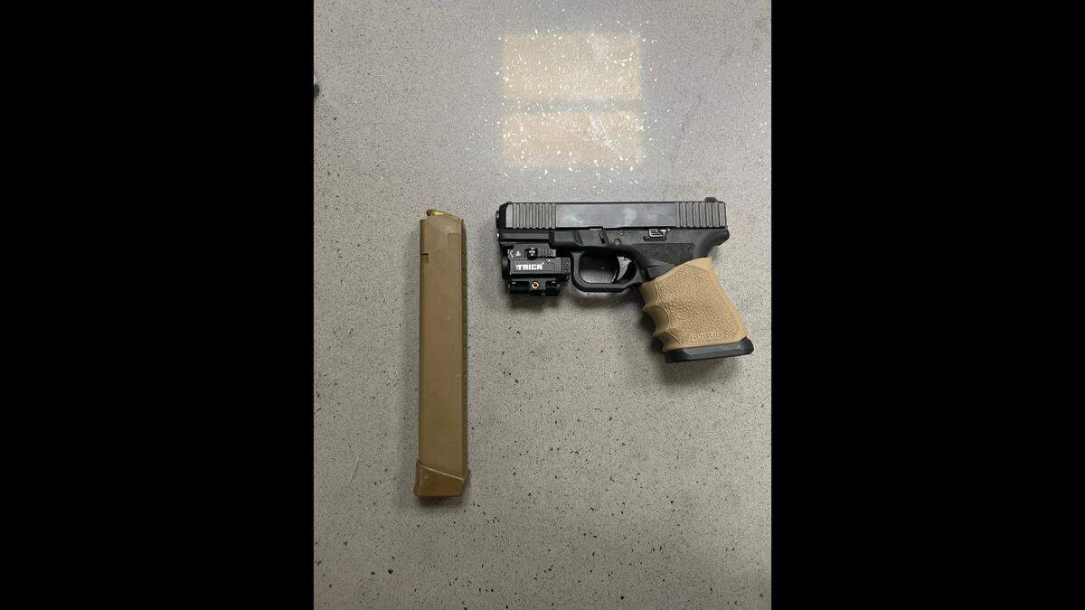 Patrick Mitchell, 18, was arrested after bringing a loaded weapon to a high school football game. A handgun with an extended magazine was found inside his waistband.