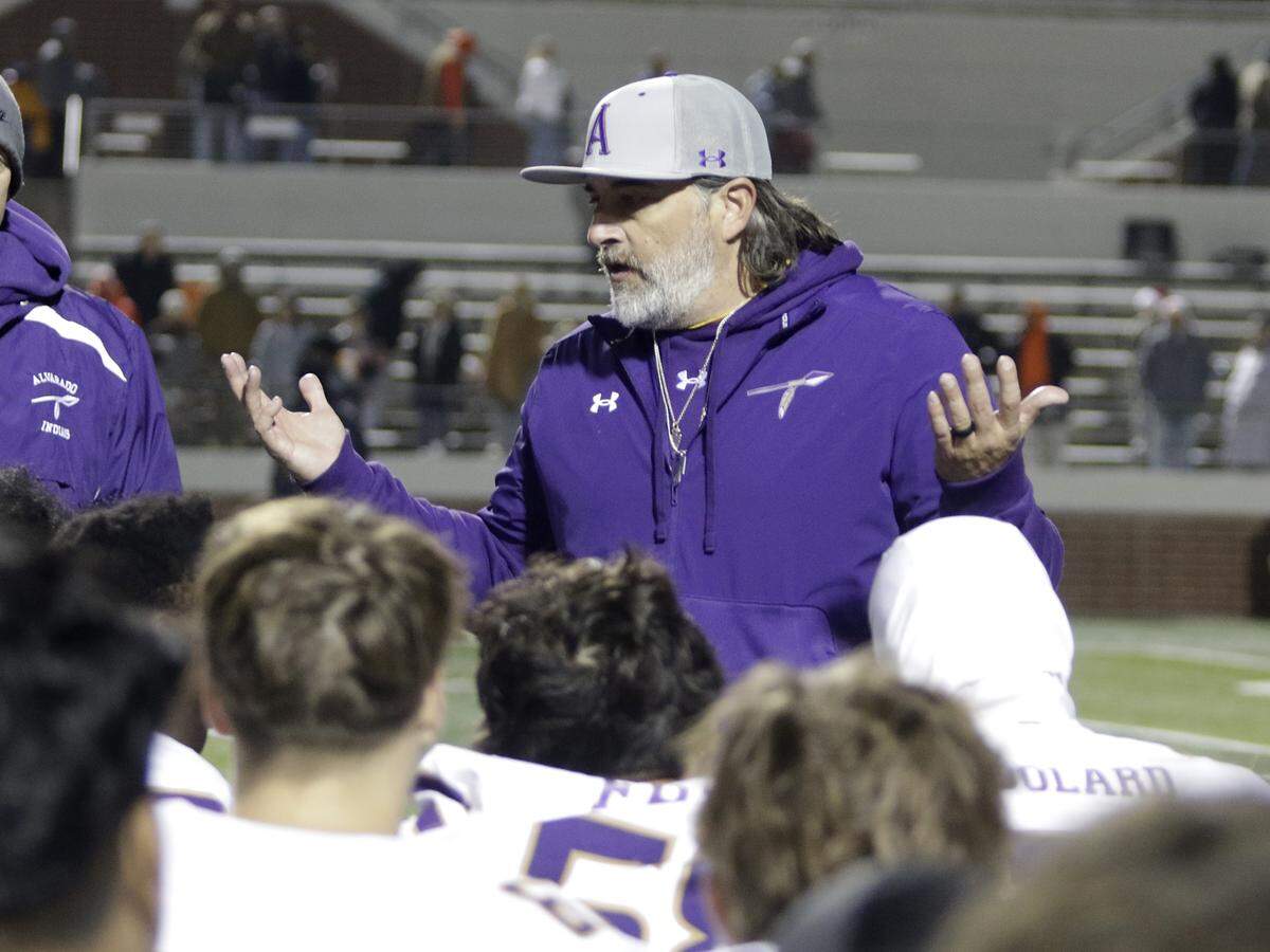 Alvarado Head Coach Casey Walraven talks with his team after their loss to Celina in their Class 4A Division I quarter-final game at Newsom Stadium on Friday, December 5, 2025, in Mansfield, Texas.