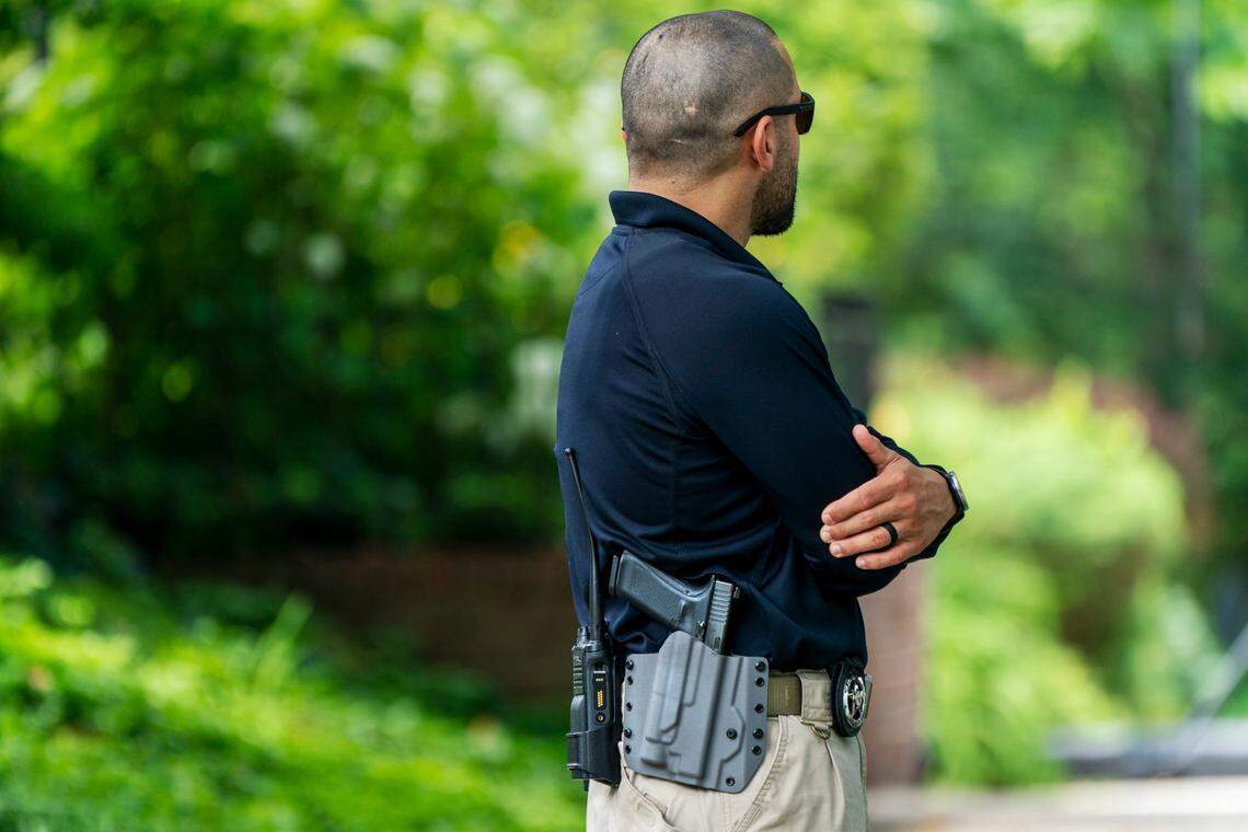 A U.S. Marshal patrols outside the home of Supreme Court Justice Brett Kavanaugh, in Chevy Chase, Md., Wednesday, June 8, 2022. Officials say an armed man who threatened to kill Justice Brett Kavanaugh was arrested near the justice’s house in Maryland. A law enforcement official says the California man in his 20s was armed with a gun and a knife. (AP Photo/Jacquelyn Martin)