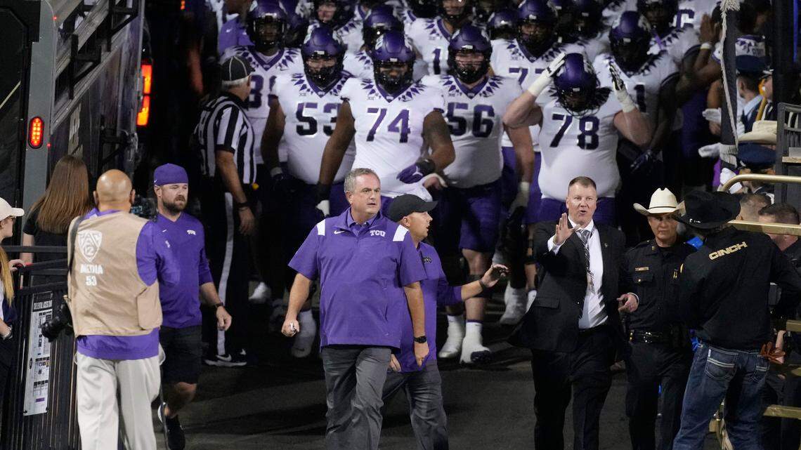 TCU coach Sonny Dykes leads the team onto the field for an NCAA college football game against Colorado on Friday, Sept. 2, 2022, in Boulder, Colo. (AP Photo/David Zalubowski)