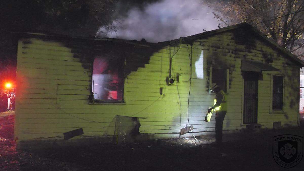 A woman was in critical condition Wednesday morning after she was found in a burning home by firefighters in east Fort Worth, fire officials said.
