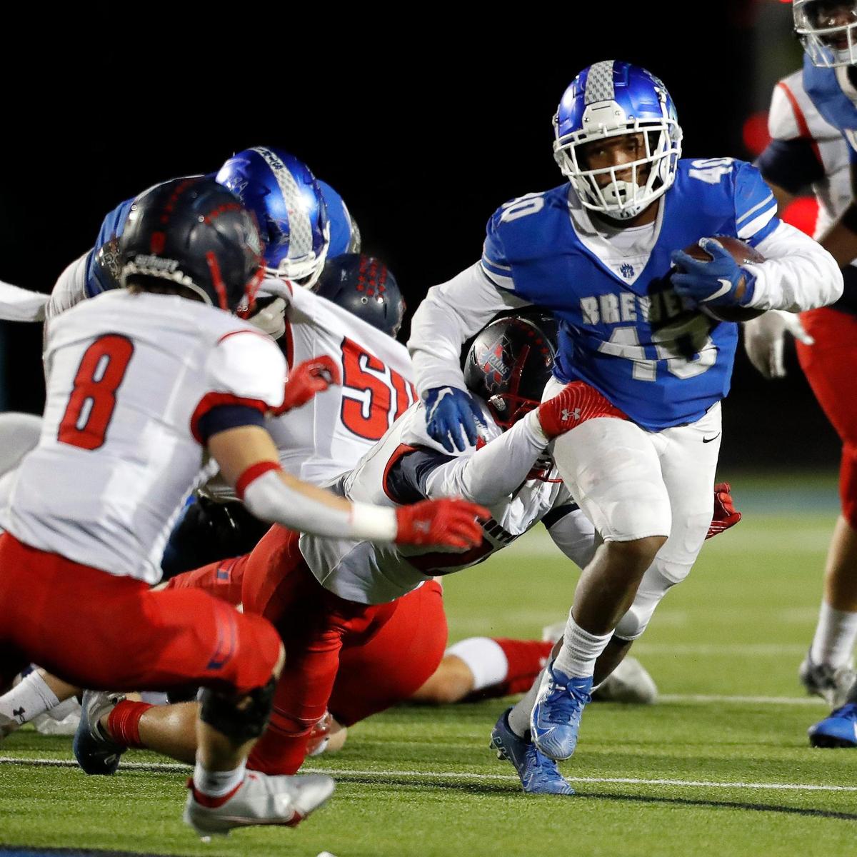 Brewer running back Montrail Cushionberry (40) breaks through the middle in a District 3-5A football game at Bear Stadium in White Settlement, Texas, Friday Oct. 29, 2021. Northwest defeated Brewer 42-17. (Special to the Star-Telegram Bob Booth)