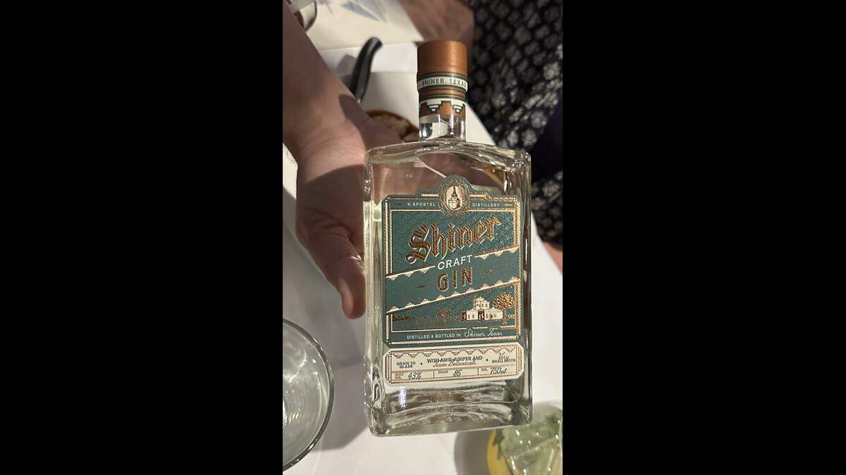 Chef Jon Bonnell displays the new Shiner Craft Gin during a tasting event at his Waters Restaurant in downtown Fort Worth on March 28, 2024.