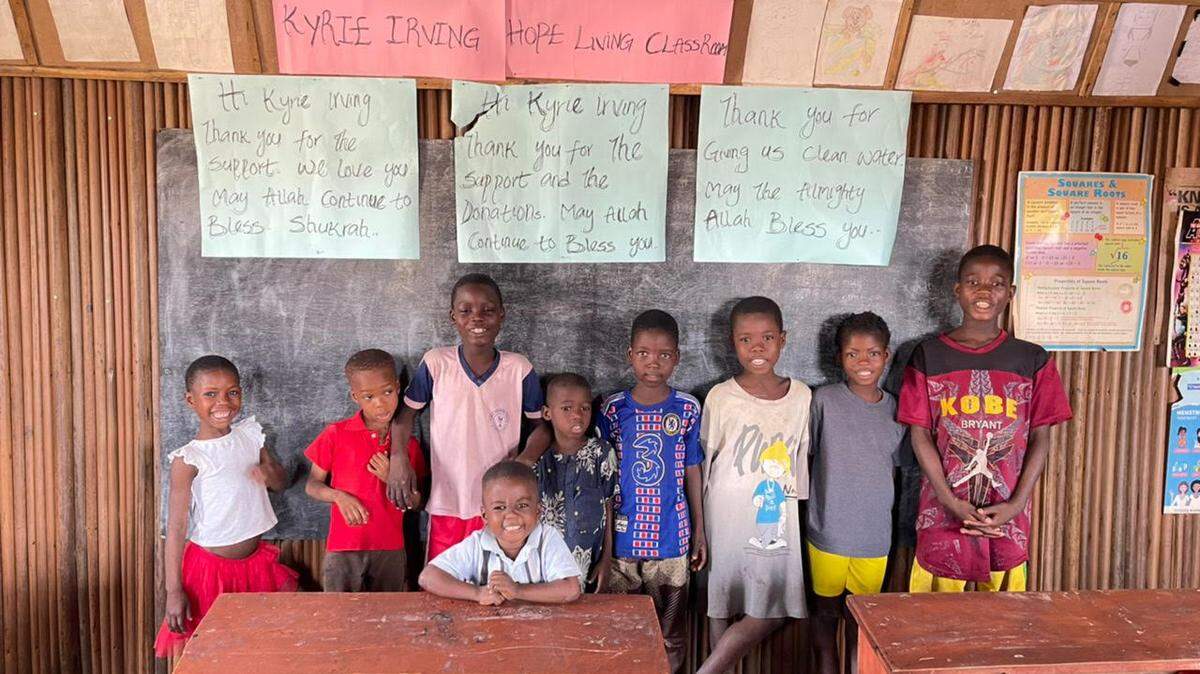 Students thanking Kyrie Irving at the Part of Solution Nursery and Primary School in Lagos, Nigeria.