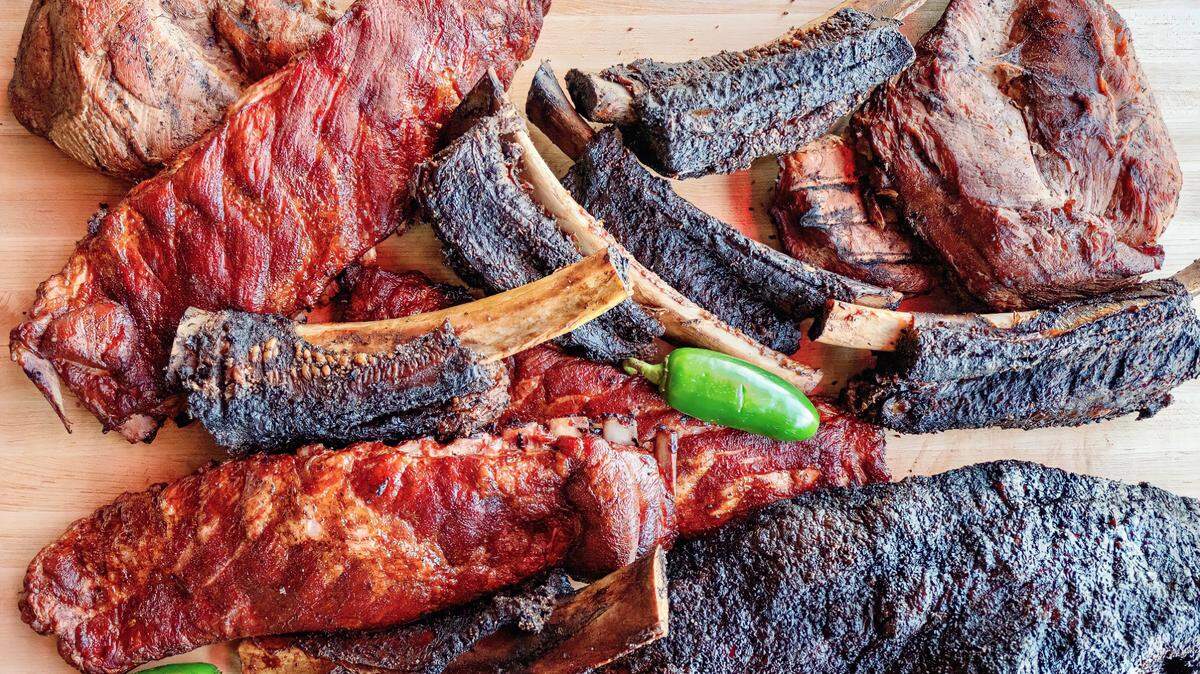 Brisket, beef ribs and meats at Loop 9 BBQ in Grand Prairie. Ribs were one of the most popular meats Texans searched “how to grill” on Google in 2023.