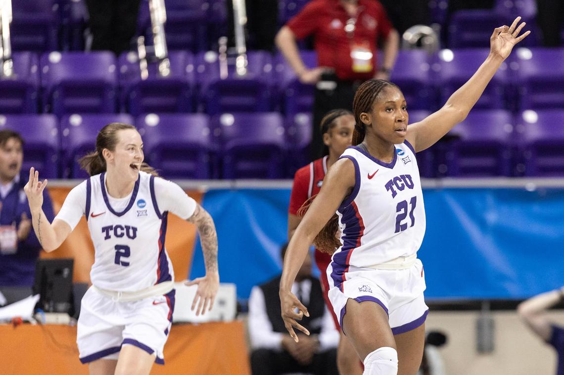TCU guards Madison Conner (2) and Agnes Emma-Nnopu (21) celebrate after an Emma-Nnopu three-point shot in the first half of the second round of the Women’s NCAA Championships Tournament game between TCU and Louisville at Schollmaier Arena in Fort Worth on Sunday, March 23, 2025.