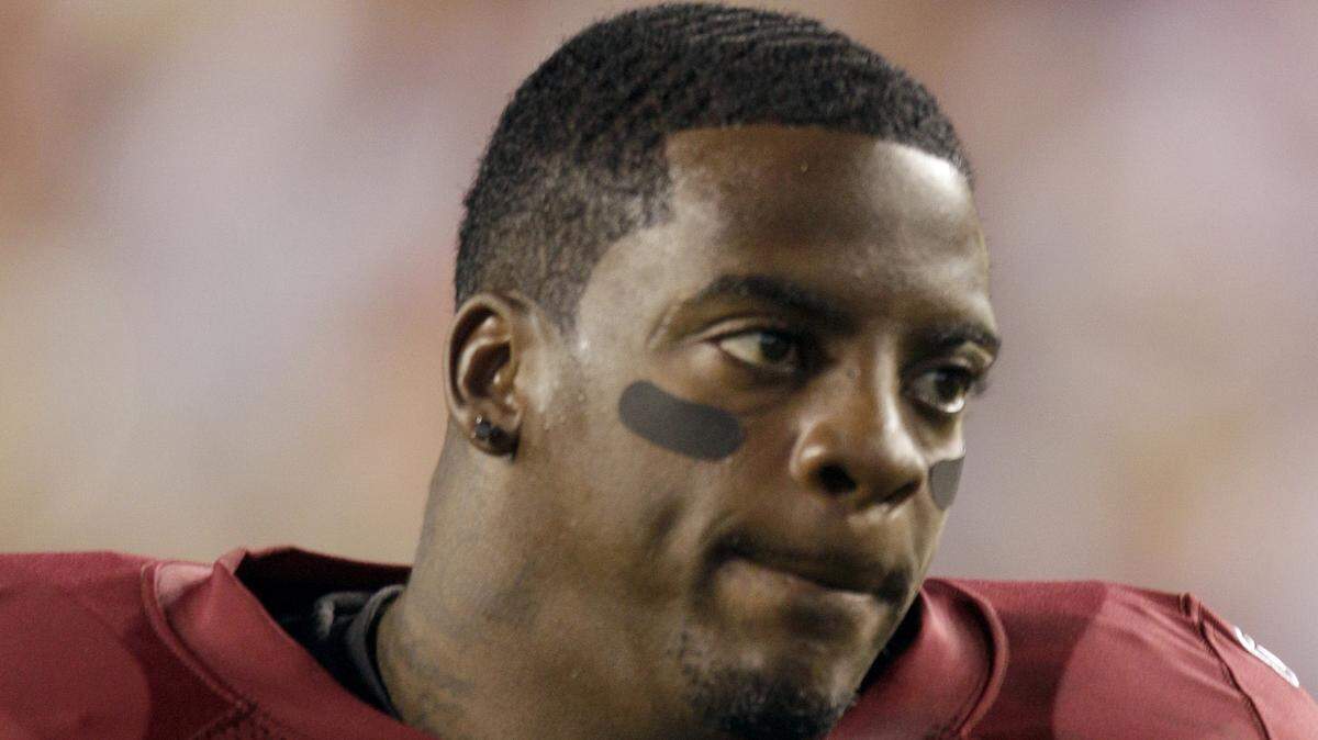 Former National Football League player Clinton Portis is one of 15 former NFL players who pleaded guilty in federal court in Kentucky in a health care fraud scheme.
