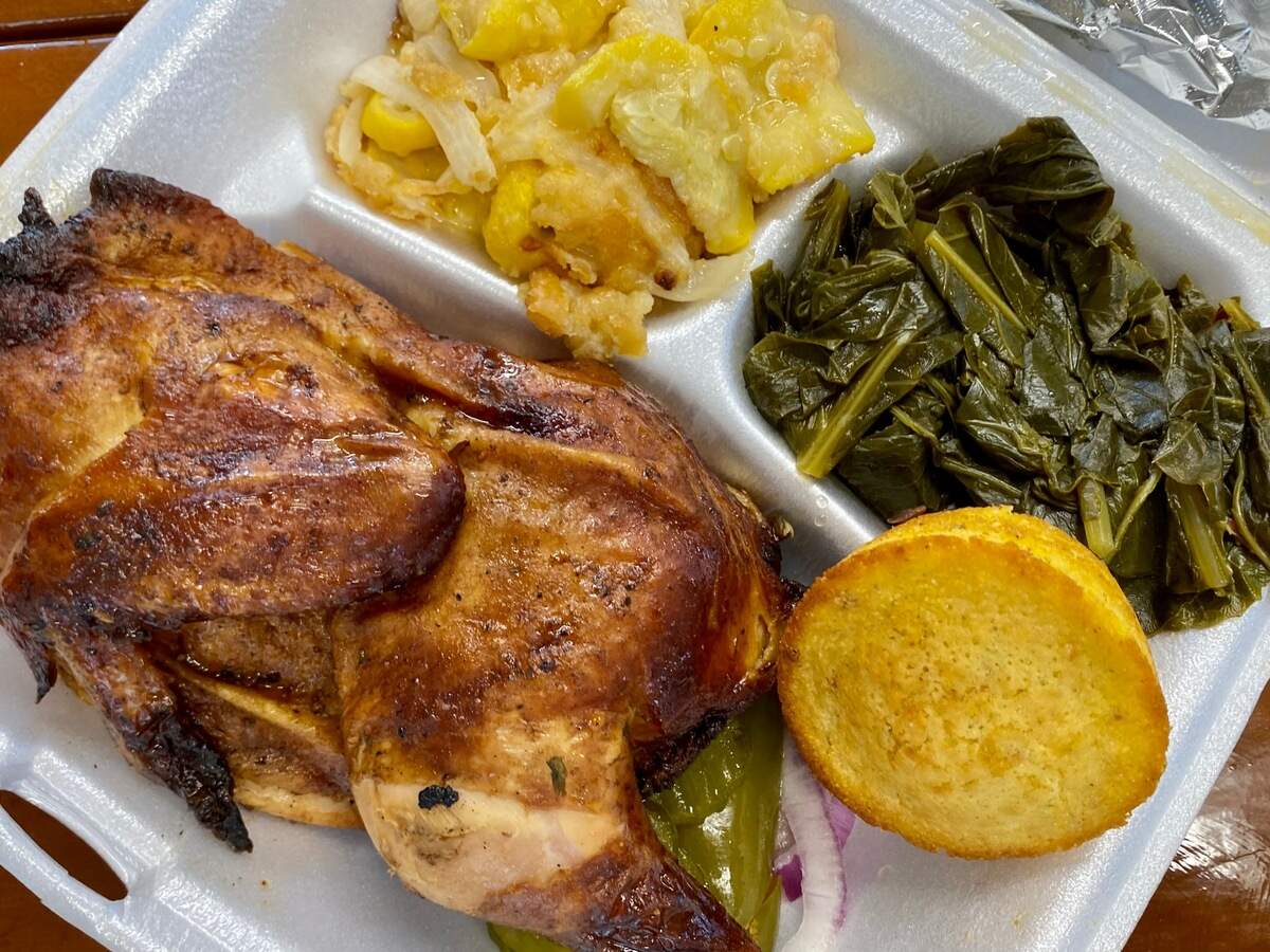 A half smoked chicken with squash and greens at Lady & the Pit.