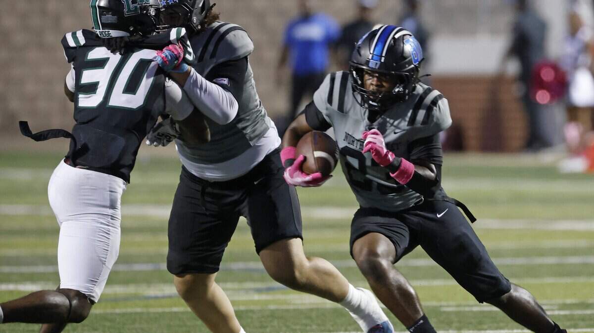 North Crowley running back Kiante Ingram (23) cuts to the outside during the first half of a UIL football game between North Crowley and Lake Ridge at Vernon Newsom Stadium in Mansfield, Texas, Thursday, October 09, 2025.