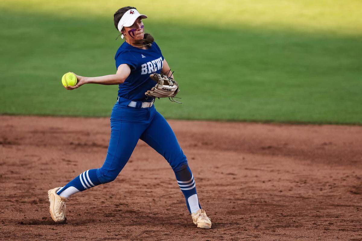 White Settlement Brewer second baseman Lilly Meller (3) attempts to make a throw against Montgomery Lake Creek in the UIL Class 5A Division II state softball championship game at Red & Charline McCombs field in Austin, Texas, on Friday, May 29, 2026.