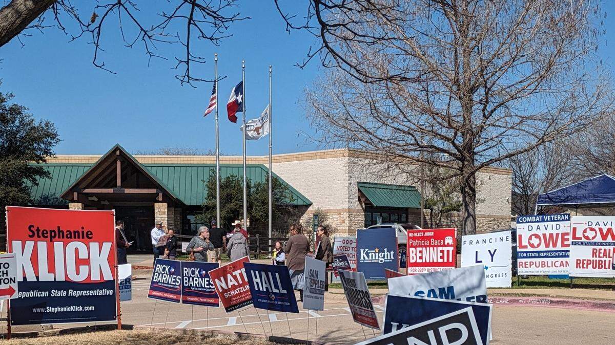 Voters outside the Summerglen Branch Library at 4205 Basswood Blvd. on Friday, the last day of early voting. Polls are open from 7 a.m. to 7 p.m. Tuesday.