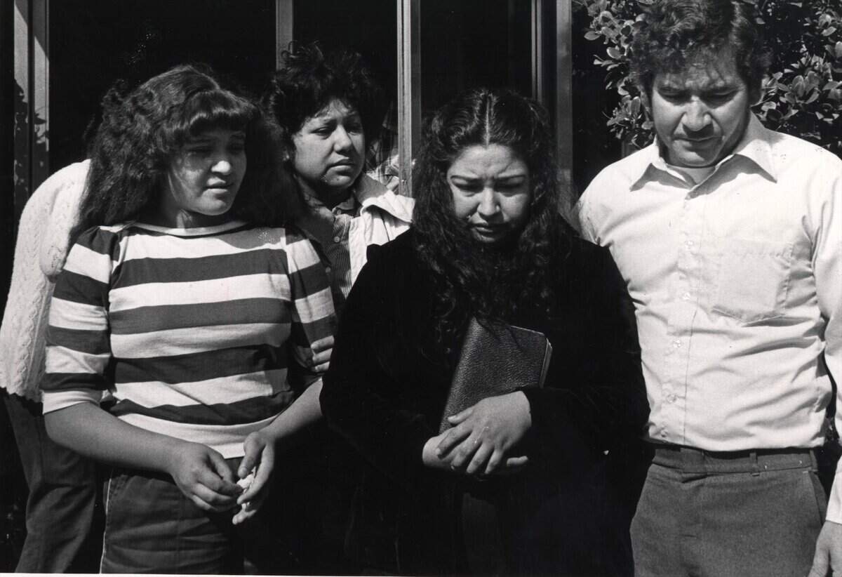 Carolina Tijerina held her son's Bible as she left a furneral home on March 28, 1983, flanked by her daughter Cassie and husband Vincent Sr. The murders of Vincent Tijerina Jr., 16, and Shelly Colliflower, 14, were never solved.