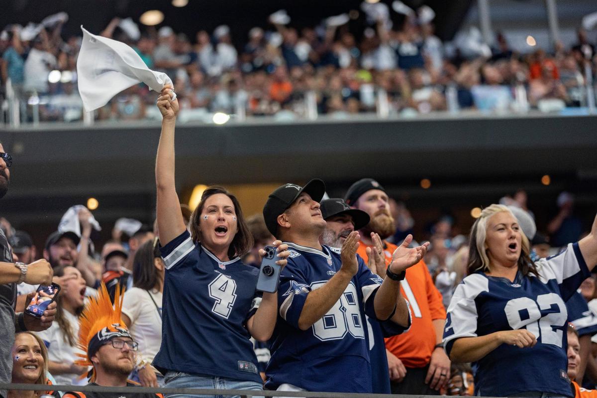 Dallas Cowboys fans react after a field goal wins the game against the Cincinnati Bengals on Sunday, Sept. 18, 2022, at the AT&T Stadium in Arlington, Texas.