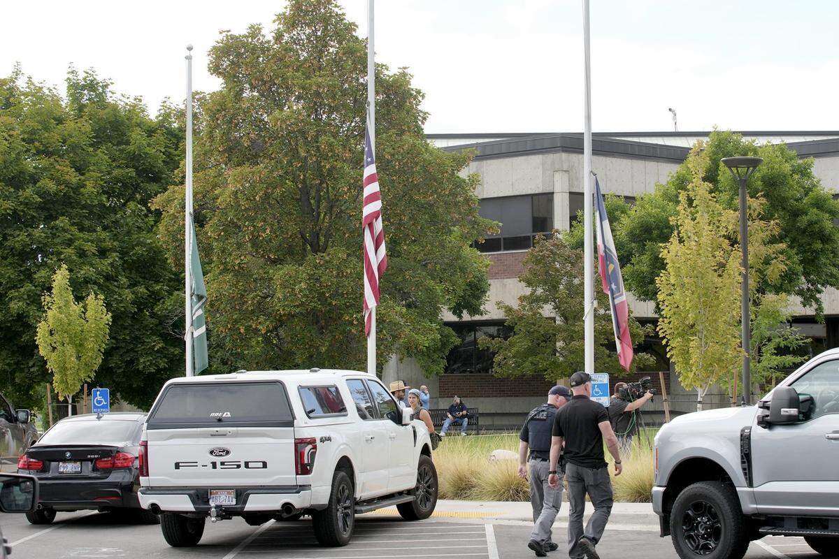 Flags fly at half-staff at Utah Valley University, where political activist Charlie Kirk was shot during an event on Wednesday, Sept. 10, 2025, in Orem, Utah. Kirk, founder of Turning Point USA, was speaking at his “American Comeback Tour” when he was killed.