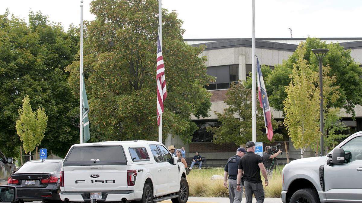 Flags fly at half-staff at Utah Valley University, where political activist Charlie Kirk was shot during an event on Wednesday, Sept. 10, 2025, in Orem, Utah. Kirk, founder of Turning Point USA, was speaking at his “American Comeback Tour” when he was killed.