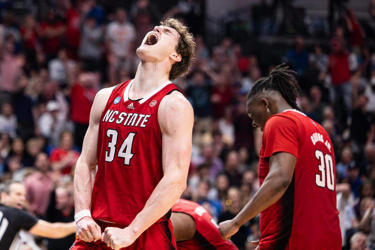 NC State forward Ben Middlebrooks (34) reacts to drawing an offensive foul in the second half of the Elite 8 South Regional Championship game between the Duke Blue Devils and NC State Wolfpack of NCAA Division I Mens Basketball Tournament at American Airlines Center in Dallas on Sunday, March 31, 2024. NC State defeated Duke 76-64.
