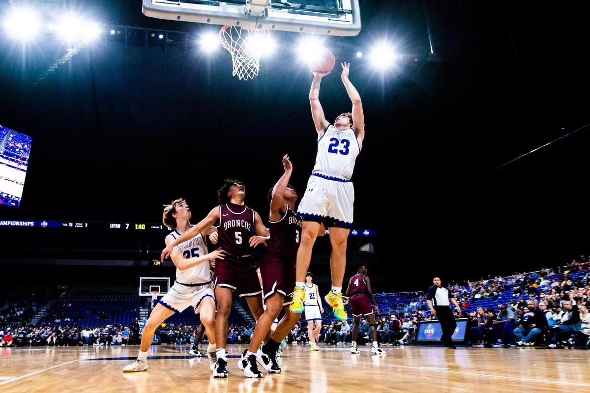 Garrett Smith (23) shoots from the post during the 2A state final game between Lipan and Clarendon in San Antonio, at the Alamodome, on March 12, 2022. Clarendon went on to win 65-51.