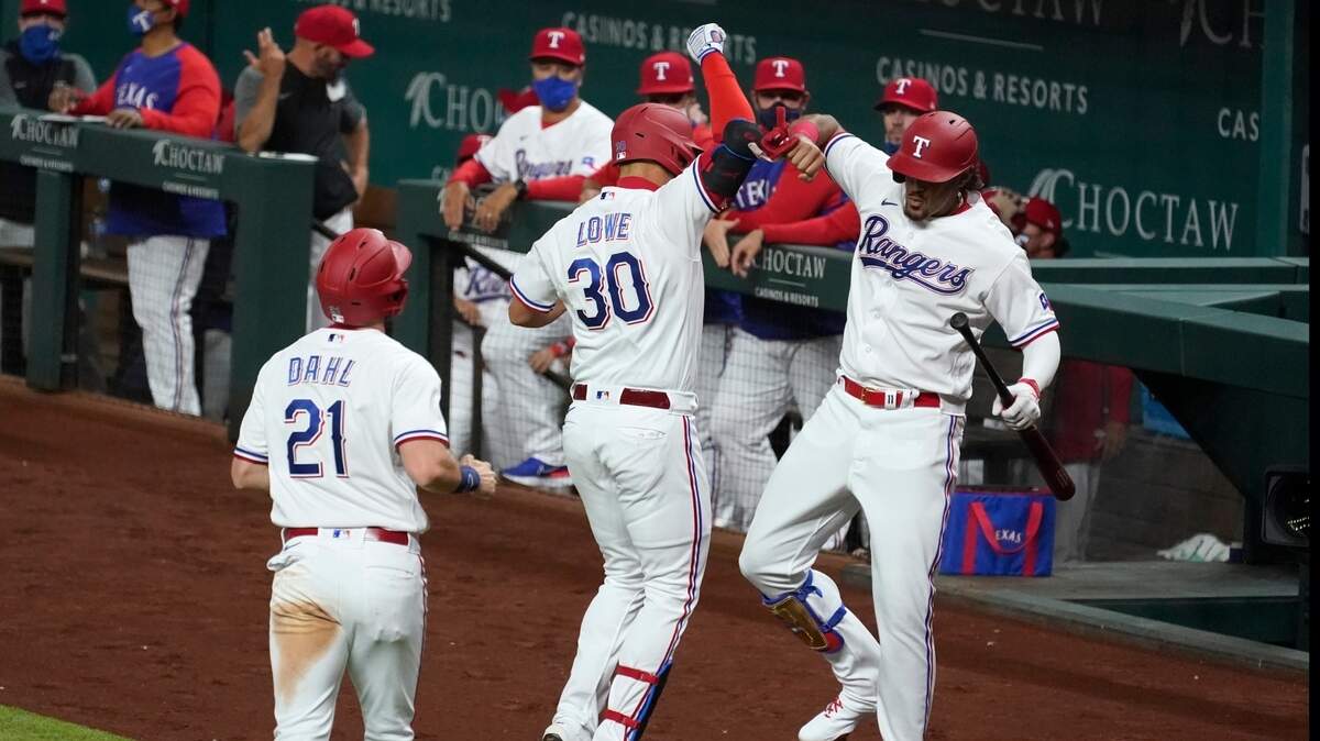 Nate Lowe, middle, and Ronald Guzman combined for three of the Texas Rangers’ four home runs in Tuesday night’s 7-4 win over the Toronto Blue Jays at Globe Life Field. Lowe hit two, two-run homers and leads the team with three this season. Who will lead the Rangers in homers? Vote in our poll.