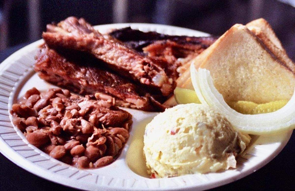 Red’s Bar-B-Que started in a small restaurant on North Henderson Street near downtown Fort Worth, serving dinners like these pork ribs from November 29, 2003.