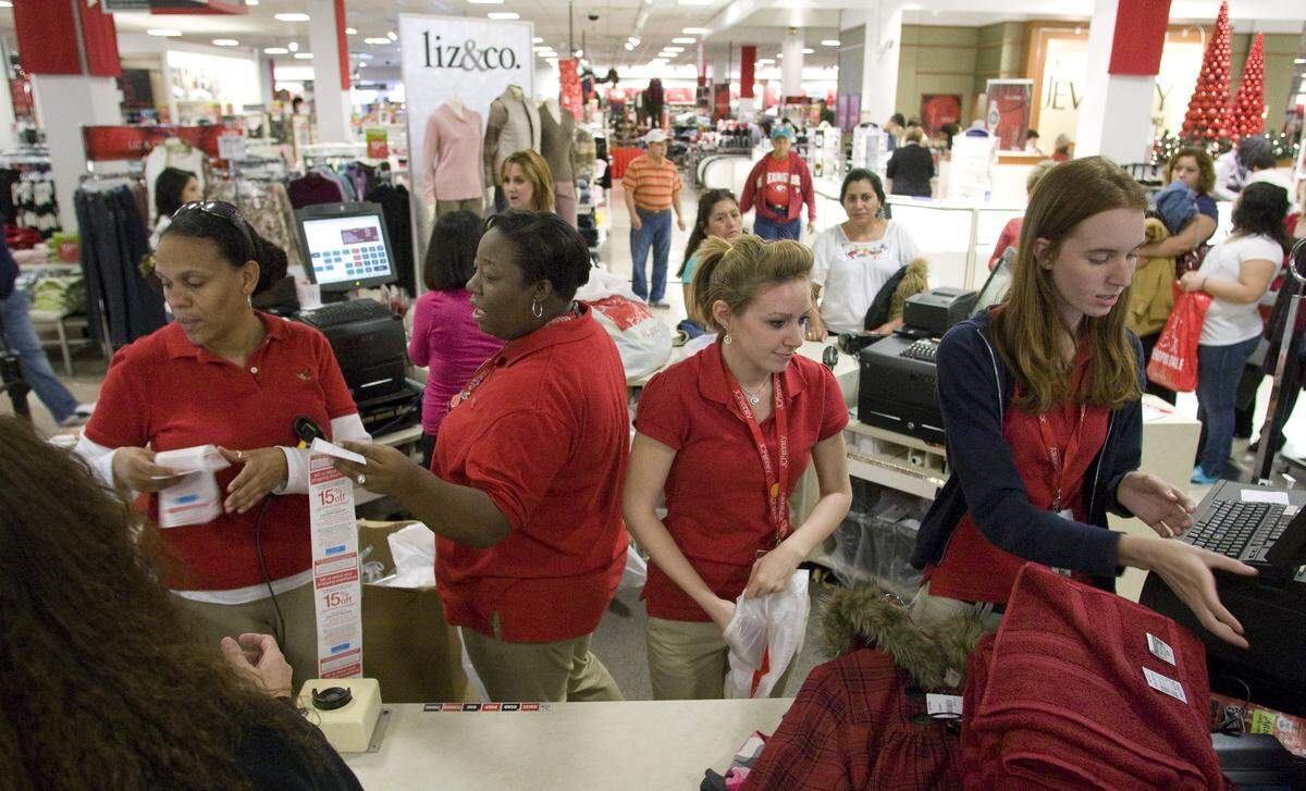 Nov. 29, 2009: The J.C. Penney women's clothing department checkout counter was busy as Black Friday shoppers crowded into Ridgmar Mall.