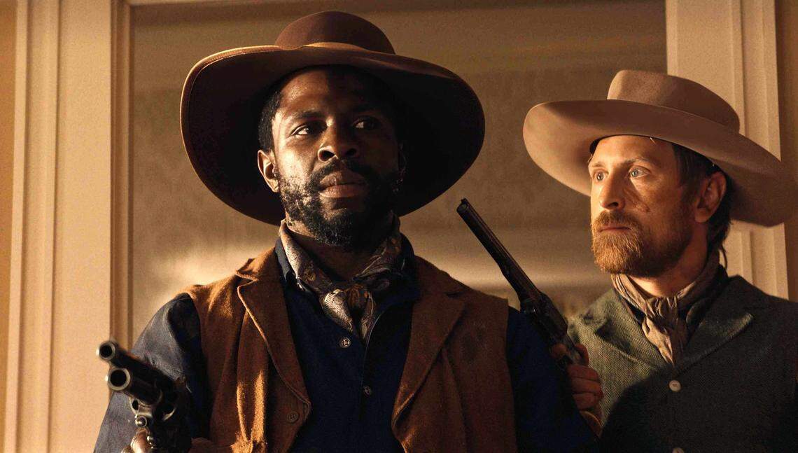 Gbenga Akinnagbe as John Scobell and Eric Nelsen as Frank Cooper in “Trail of Vengeance.”