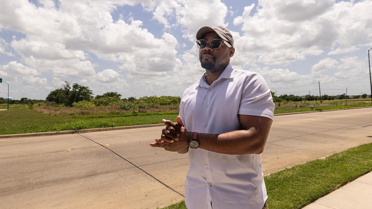 Kenny Mosley is director of the Renaissance Heights Foundation, which works in the development of the area to improve the quality of life for residents and businesses.. The land behind him is slated for development of affordable housing by the Fort Worth Community Land Trust.