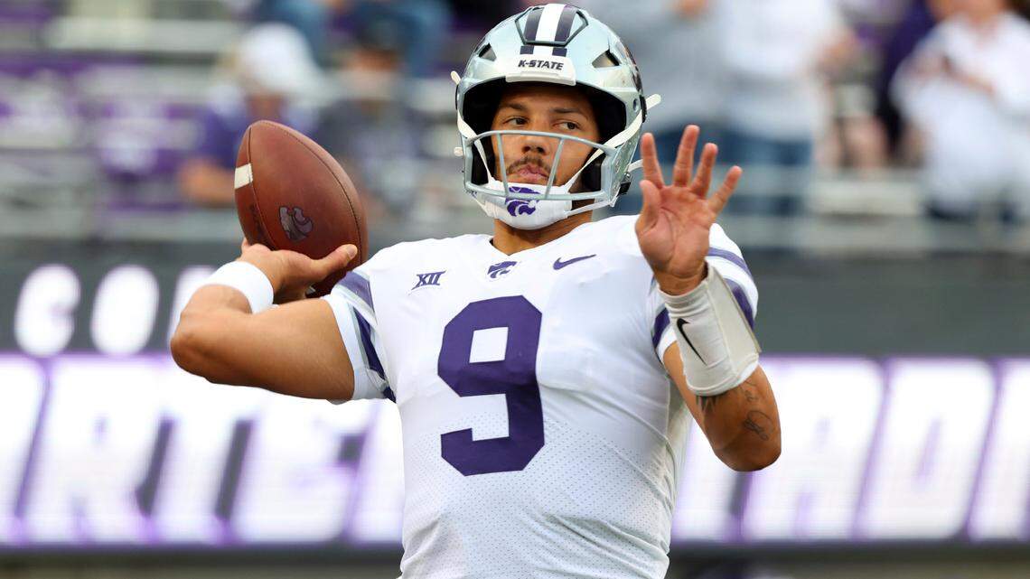 Kansas State quarterback Adrian Martinez (9) warms up before an NCAA college football game against TCU, Saturday, Oct. 22, 2022, in Fort Worth, Texas. (AP Photo/Richard W. Rodriguez)