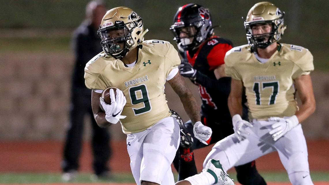 Birdville running back Laderrious Mixon (9) gets past Colleyville Heritage safety Luke Mabe (7) for a 76 yard touchdown run during the first haif, Friday night, November 1 2019 played at Mustang Panther Stadium in Grapevine, TX.
