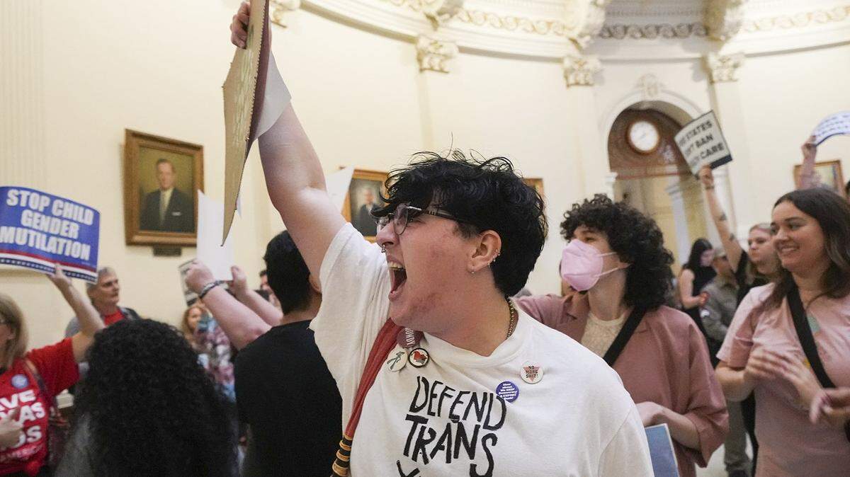 Harlan Carroll cheers as LGBTQ rights activists protest in May at the Texas Capitol in Austin. (Mikala Compton-USA TODAY NETWORK)
