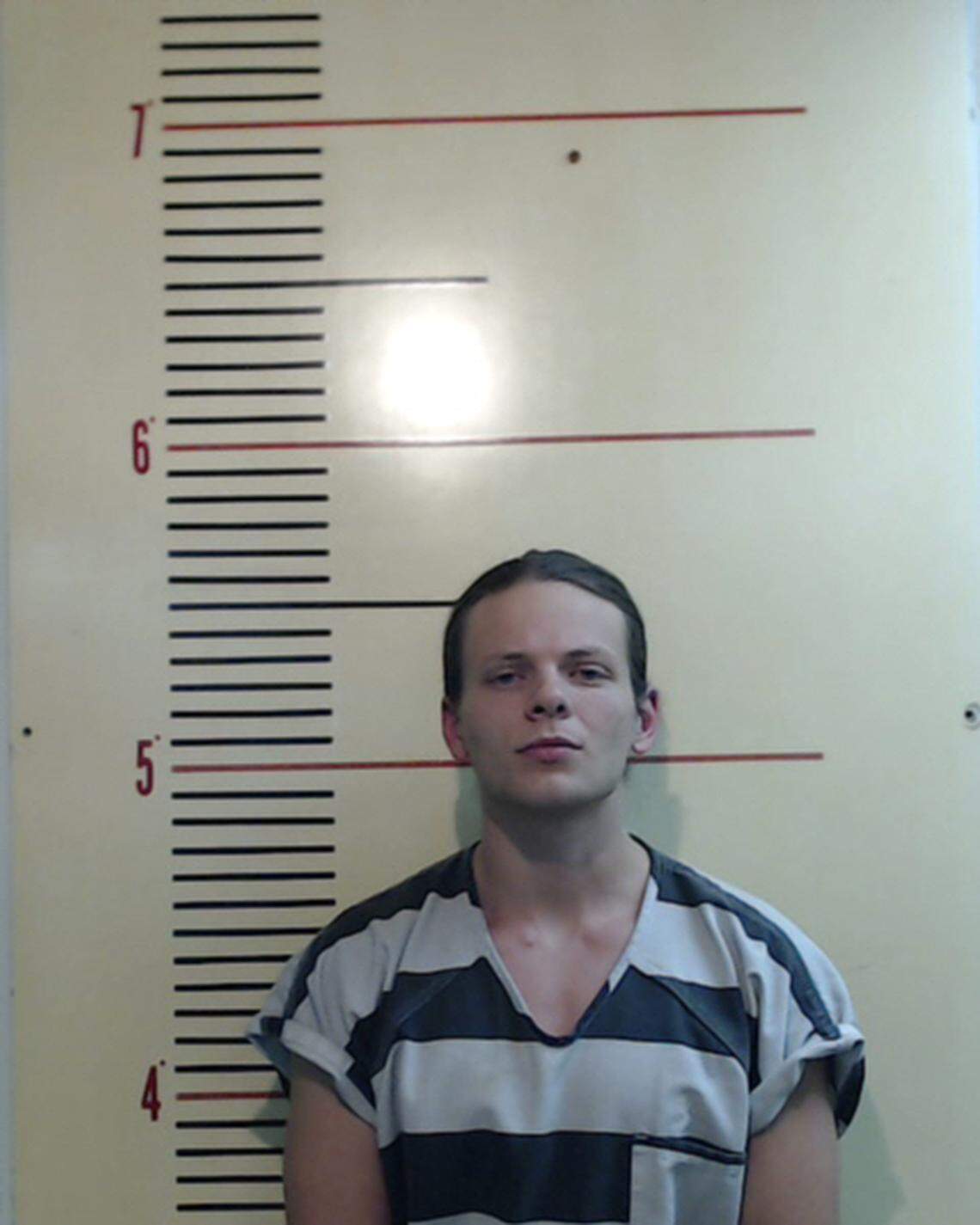 Thomas Ryan Rousseau was arrested on Saturday in Weatherford after police said he placed stickers on county property. Rousseau is the leader of the white nationalist group Patriot Front, according to the Southern Poverty Law Center and the Anti-Defamation League.