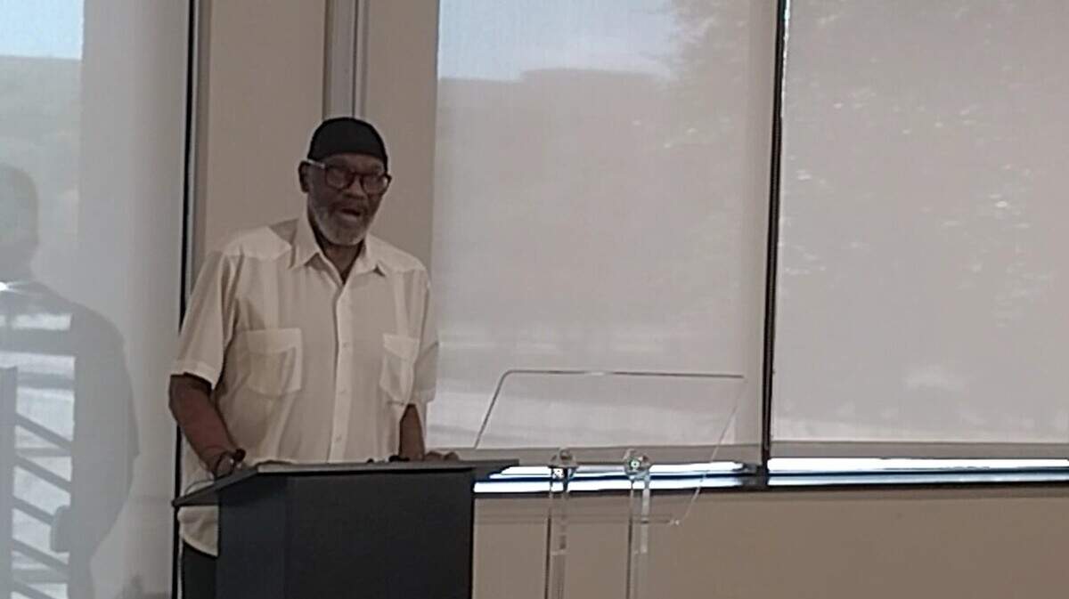Mustafaa Carroll, a spokesperson for the Council on American-Islamic Relations, reads a statement at a news conference Saturday about an alleged hate crime committed against a Palestinian woman and her two children at a Euless swimming pool in May. A 42-year-old woman has been arrested and charged with attempted capital murder and injury to a child.