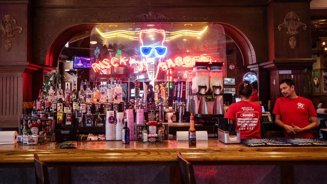 Staff work at Riscky’s BBQ in downtown Fort Worth.
