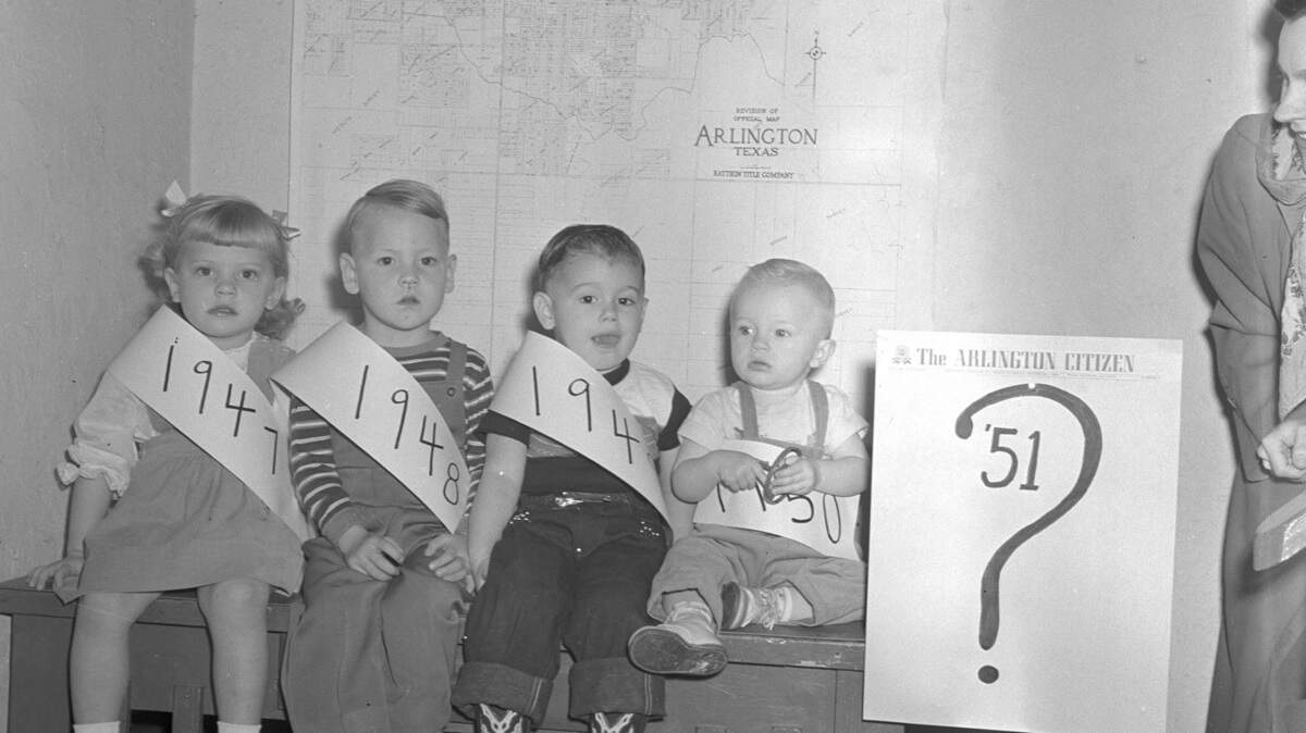 Anticipating the first baby born in Arlington in 1951, the Arlington Citizen rounded up some of the city’s previous winners, from left: Susan Frances Tubb (1947), Kenneth Paul Luzader (1948), Charlie Clint Turner (1949), and Michael Eugene Green (1950).