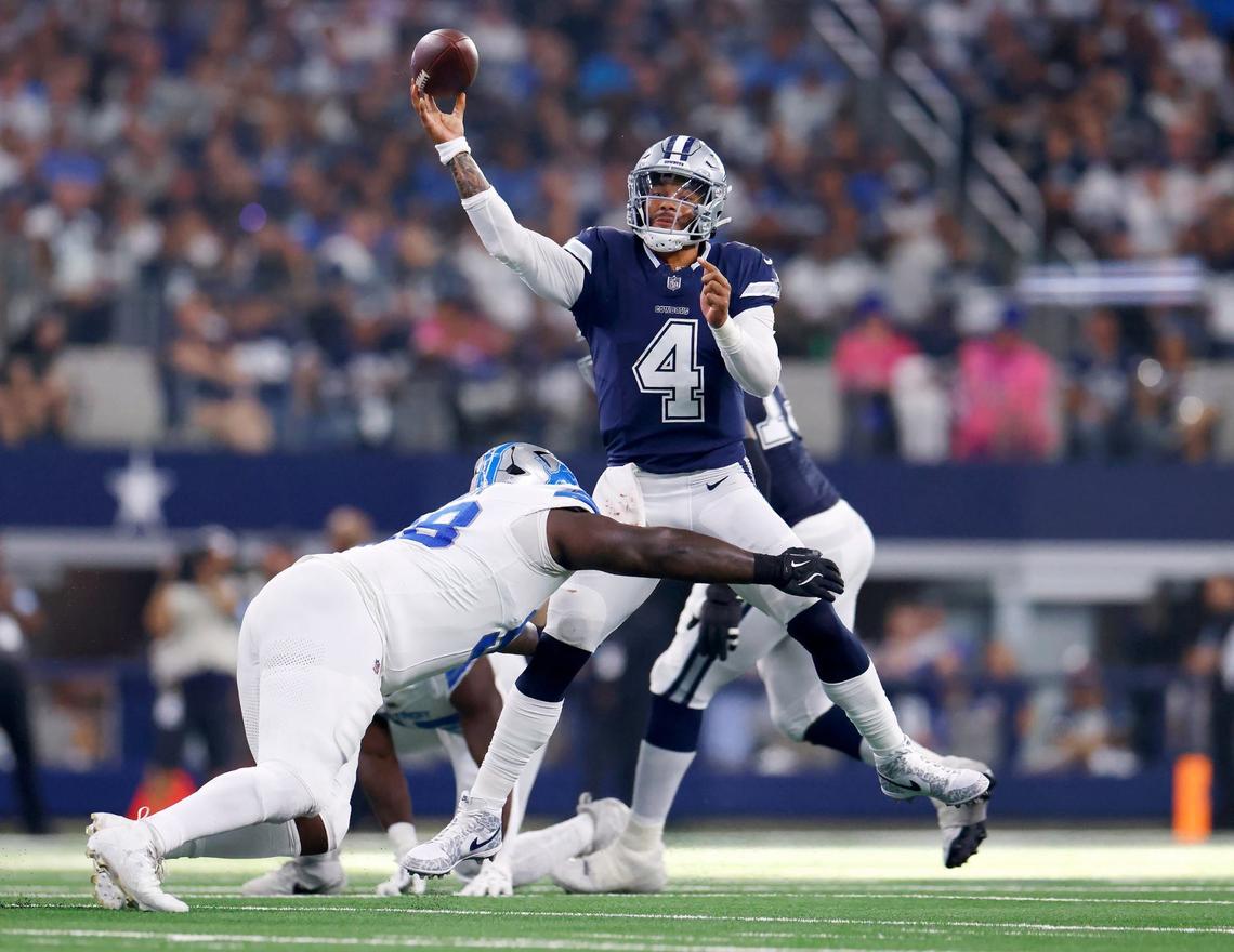Dallas Cowboys quarterback Dak Prescott releases the ball before being tackled by Detroit Lions’ DJ Reader on Sunday, Oct. 13, 2024, at AT&T Stadium in Arlington.