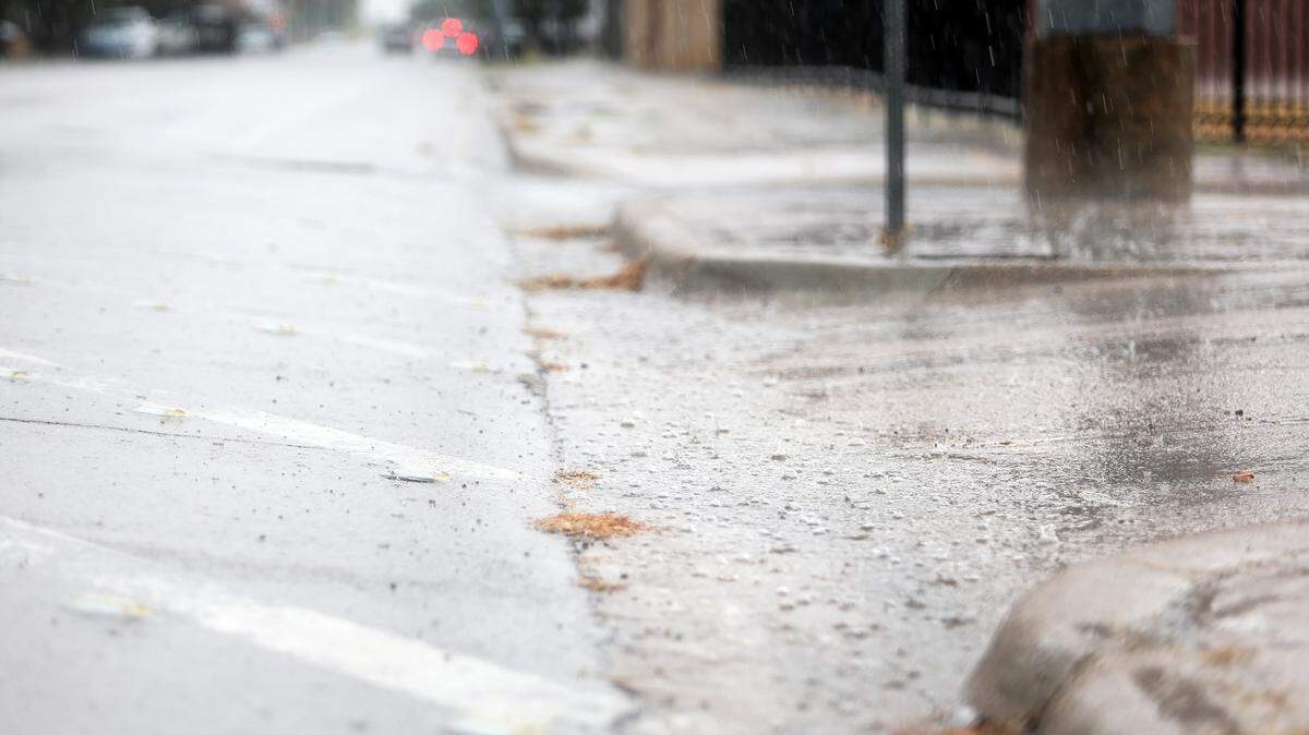 Rain falls along a road in this file photo. Here’s when St. Louis forecasters expect rain in the metro-east.