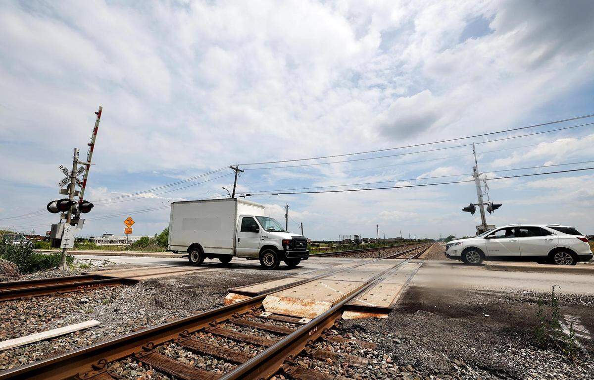Vehicles cross the BNSF railroad tracks on Bonds Ranch Road just west of U.S. 287 on Monday, June 5, 2023, in north Fort Worth. The Federal Railroad Administration has allocated $17 million to TxDOT to build a four-lane bridge across the BNSF tracks.