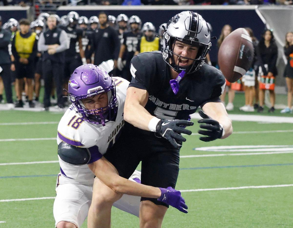 Alvarado defensive back Aidan Herington (18) breaks up a touchdown pass intended for Panther Creek wide receiver Parker Ord (5) during a UIL 4A D1 Area round football playoff game at The Ford Center in Frisco Texas, Thursday, Nov. 21, 2024.