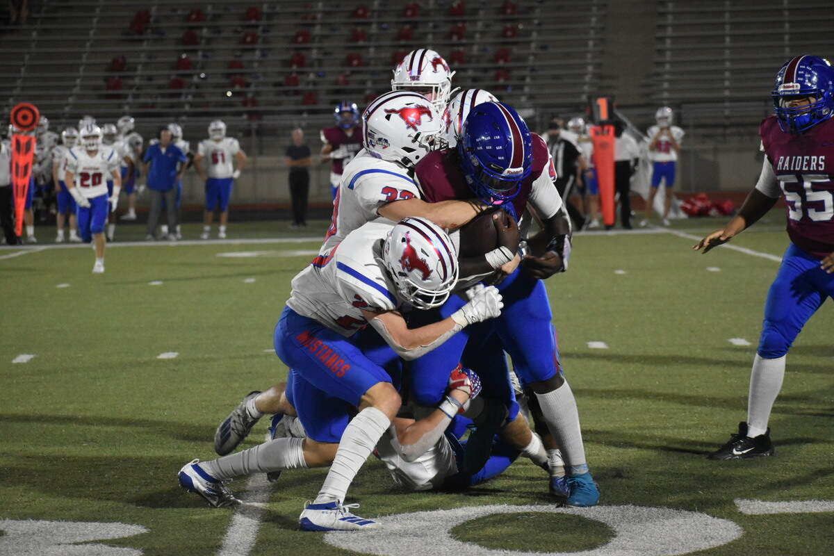 Grapevine players try to tackle Southwest’s Raylon Carter (17) but he powers through for extra yards during a high school football game at Clark Stadium in Fort Worth, Texas, Friday Oct. 8, 2021 Grapevine won 51-0. (Michelle Escalante/special to the Star-Telegram)