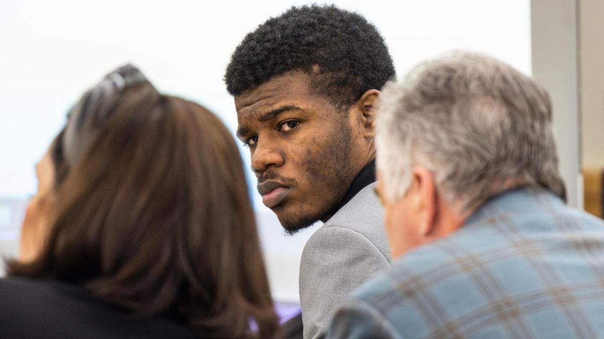 Damond Cotton sits next to his defense attorneys in the courtroom at his murder trial in Tarrant County’s 396th District Court at the Tim Curry Criminal Justice Center on Thursday, March 21, 2024. A jury found Cotton, who was hired by the victim’s son, guilty in the 2022 shooting death of Kevin Brown Sr. in Fort Worth.