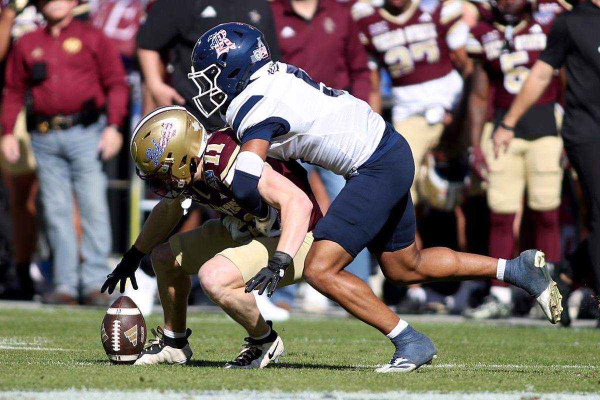 FORT WORTH, TEXAS - JANUARY 02: Beau Sparks #11 of the Texas State Bobcats fumbles the ball against the Rice Owls during the first half of the 2026 Lockheed Martin Armed Forces Bowl at Amon G. Carter Stadium on January 02, 2026 in Fort Worth, Texas. (Photo by Tim Heitman/Getty Images)
