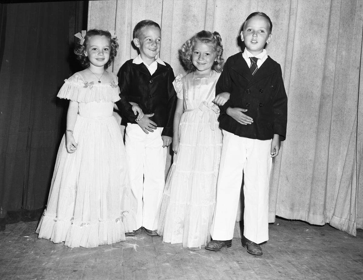 May 3, 1946: From left, first-graders Lyndhan Shivers and Darrell Bentley, and second-graders Peggy Dougherty and George Lindsey Gaston. The children were named princes and princesses at the Keller School May Fete.